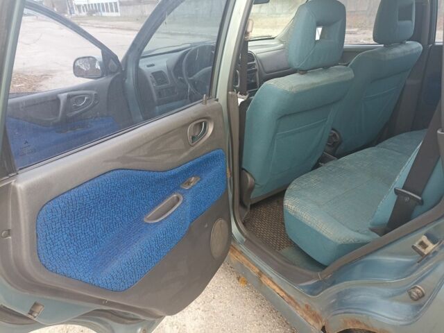 Зелений Міцубісі Спейс Стар, об'ємом двигуна 1.6 л та пробігом 319 тис. км за 1800 $, фото 4 на Automoto.ua