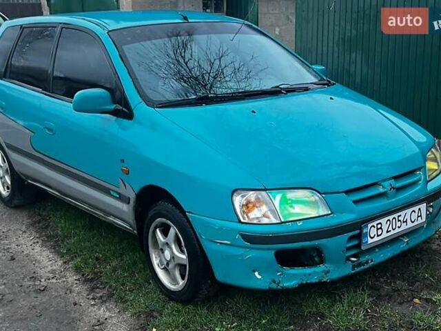 Зеленый Мицубиси Спейс Стар, объемом двигателя 1.3 л и пробегом 430 тыс. км за 2500 $, фото 4 на Automoto.ua