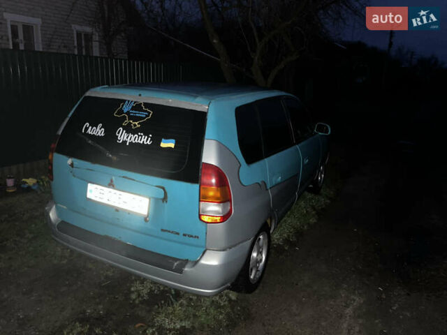Зеленый Мицубиси Спейс Стар, объемом двигателя 1.3 л и пробегом 430 тыс. км за 2500 $, фото 19 на Automoto.ua
