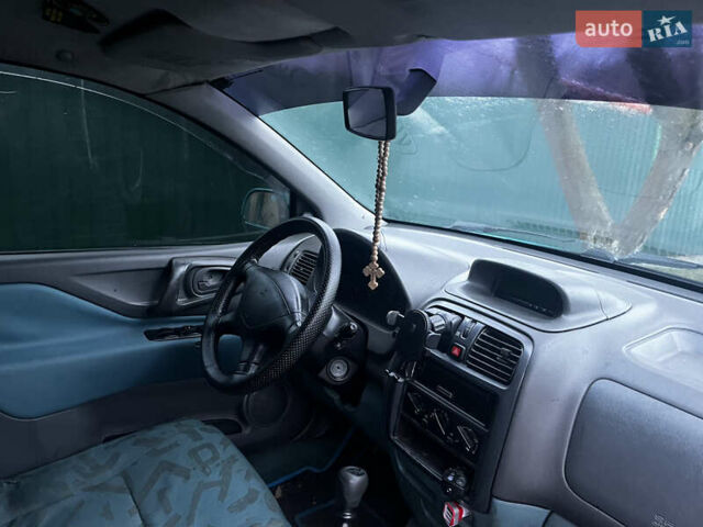 Зеленый Мицубиси Спейс Стар, объемом двигателя 1.3 л и пробегом 430 тыс. км за 2500 $, фото 13 на Automoto.ua