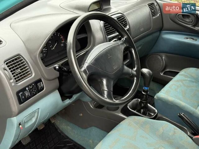 Зеленый Мицубиси Спейс Стар, объемом двигателя 1.3 л и пробегом 203 тыс. км за 3000 $, фото 7 на Automoto.ua