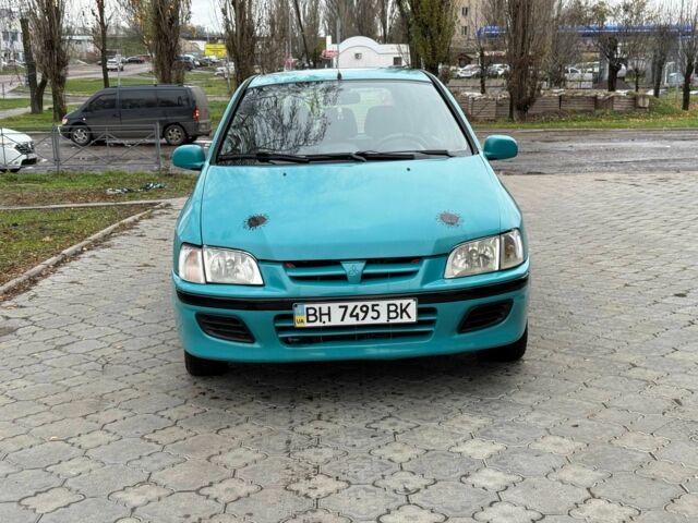 Зеленый Мицубиси Спейс Стар, объемом двигателя 1.3 л и пробегом 205 тыс. км за 3000 $, фото 1 на Automoto.ua