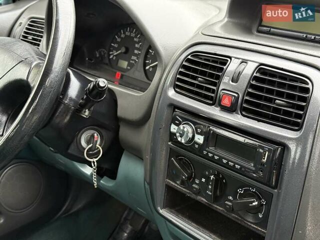 Зеленый Мицубиси Спейс Стар, объемом двигателя 1.3 л и пробегом 203 тыс. км за 3000 $, фото 13 на Automoto.ua