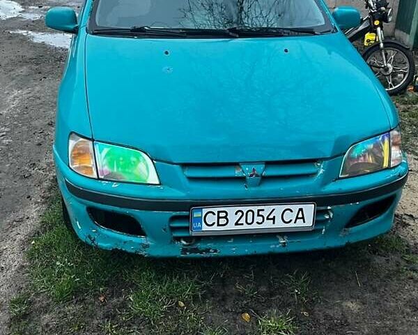 Зеленый Мицубиси Спейс Стар, объемом двигателя 1.3 л и пробегом 430 тыс. км за 2500 $, фото 5 на Automoto.ua
