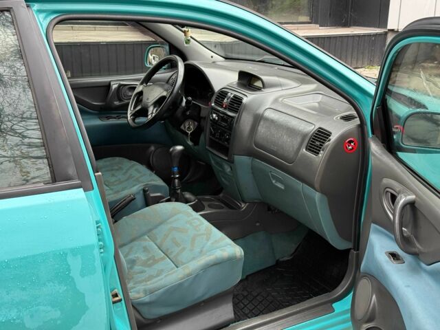 Зеленый Мицубиси Спейс Стар, объемом двигателя 1.3 л и пробегом 205 тыс. км за 3000 $, фото 10 на Automoto.ua