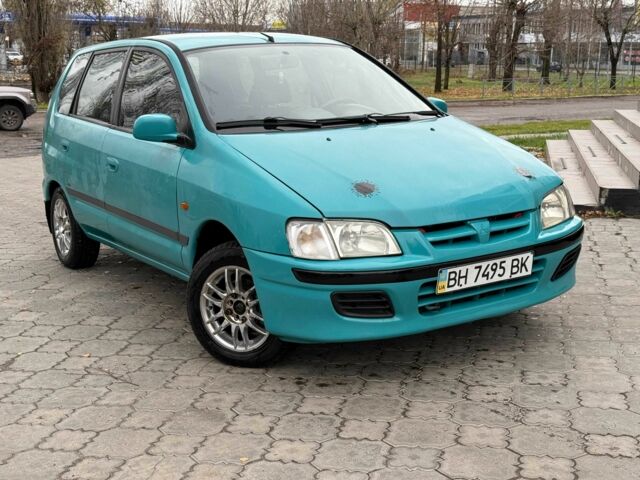 Зеленый Мицубиси Спейс Стар, объемом двигателя 1.3 л и пробегом 205 тыс. км за 3000 $, фото 2 на Automoto.ua