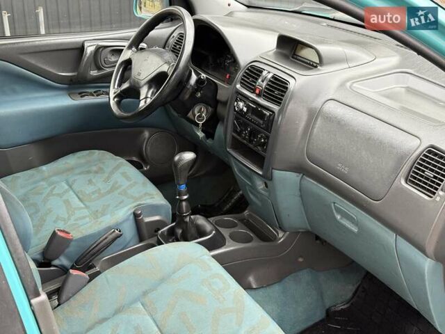 Зеленый Мицубиси Спейс Стар, объемом двигателя 1.3 л и пробегом 203 тыс. км за 3000 $, фото 11 на Automoto.ua