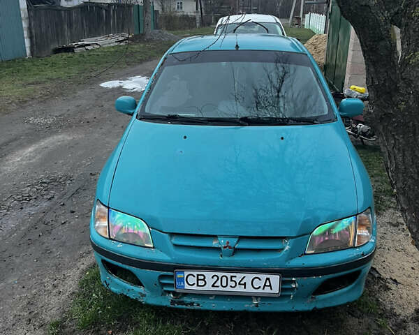 Зеленый Мицубиси Спейс Стар, объемом двигателя 1.3 л и пробегом 430 тыс. км за 2500 $, фото 10 на Automoto.ua