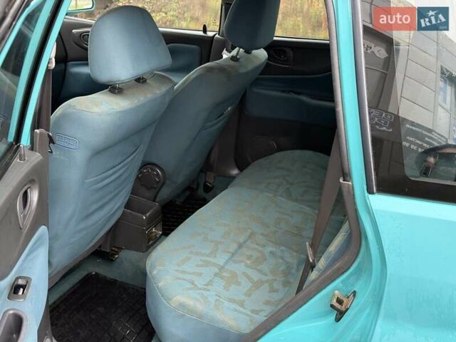 Зеленый Мицубиси Спейс Стар, объемом двигателя 1.3 л и пробегом 203 тыс. км за 3000 $, фото 8 на Automoto.ua