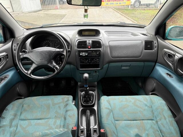 Зеленый Мицубиси Спейс Стар, объемом двигателя 1.3 л и пробегом 205 тыс. км за 3000 $, фото 12 на Automoto.ua