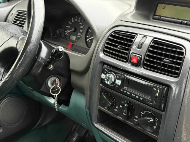 Зеленый Мицубиси Спейс Стар, объемом двигателя 1.3 л и пробегом 205 тыс. км за 3000 $, фото 13 на Automoto.ua