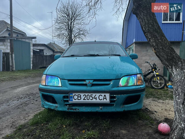 Зеленый Мицубиси Спейс Стар, объемом двигателя 1.3 л и пробегом 430 тыс. км за 2500 $, фото 9 на Automoto.ua