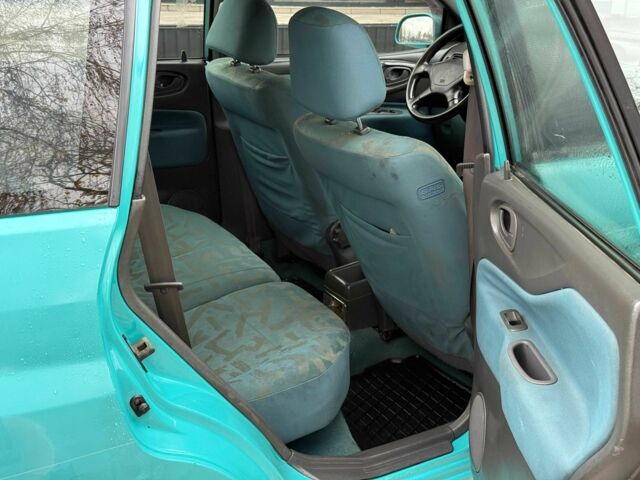 Зеленый Мицубиси Спейс Стар, объемом двигателя 1.3 л и пробегом 205 тыс. км за 3000 $, фото 9 на Automoto.ua