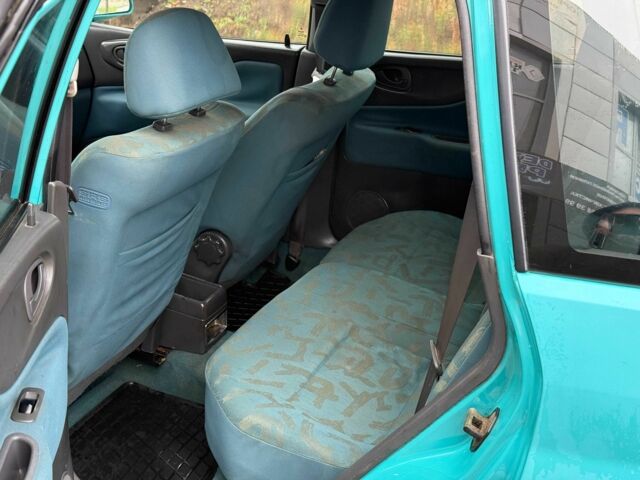 Зеленый Мицубиси Спейс Стар, объемом двигателя 1.3 л и пробегом 205 тыс. км за 3000 $, фото 8 на Automoto.ua