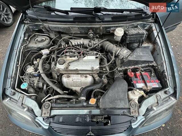 Зеленый Мицубиси Спейс Стар, объемом двигателя 1.8 л и пробегом 307 тыс. км за 3300 $, фото 4 на Automoto.ua