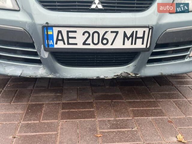 Зеленый Мицубиси Спейс Стар, объемом двигателя 1.8 л и пробегом 307 тыс. км за 3300 $, фото 23 на Automoto.ua