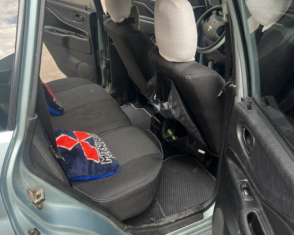 Зелений Міцубісі Спейс Стар, об'ємом двигуна 1.6 л та пробігом 173 тис. км за 3500 $, фото 15 на Automoto.ua