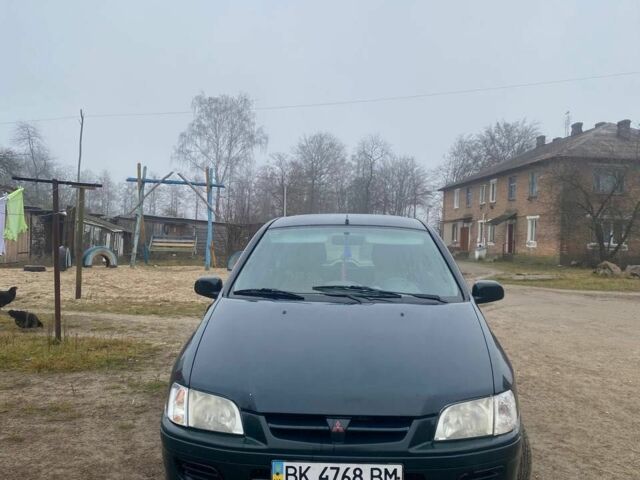 Зеленый Мицубиси Спейс Стар, объемом двигателя 1.3 л и пробегом 280 тыс. км за 1700 $, фото 1 на Automoto.ua