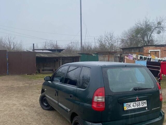 Зеленый Мицубиси Спейс Стар, объемом двигателя 1.3 л и пробегом 280 тыс. км за 1700 $, фото 2 на Automoto.ua