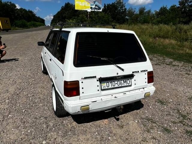 Белый Мицубиси Спейс Вагон, объемом двигателя 2 л и пробегом 260 тыс. км за 1300 $, фото 4 на Automoto.ua