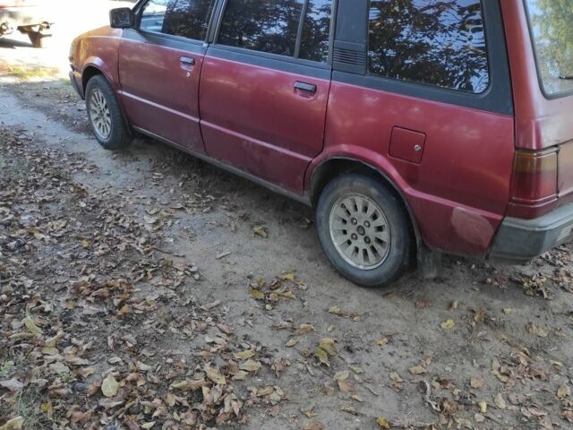 Красный Мицубиси Спейс Вагон, объемом двигателя 1.8 л и пробегом 325 тыс. км за 1150 $, фото 1 на Automoto.ua