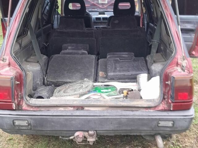 Красный Мицубиси Спейс Вагон, объемом двигателя 1.8 л и пробегом 325 тыс. км за 1150 $, фото 6 на Automoto.ua