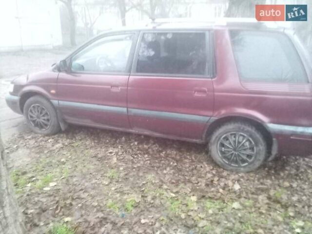 Красный Мицубиси Спейс Вагон, объемом двигателя 2 л и пробегом 300 тыс. км за 1700 $, фото 5 на Automoto.ua