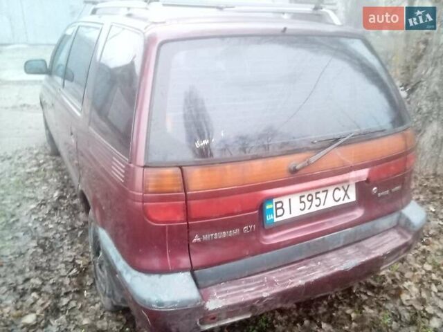 Красный Мицубиси Спейс Вагон, объемом двигателя 2 л и пробегом 300 тыс. км за 1700 $, фото 8 на Automoto.ua