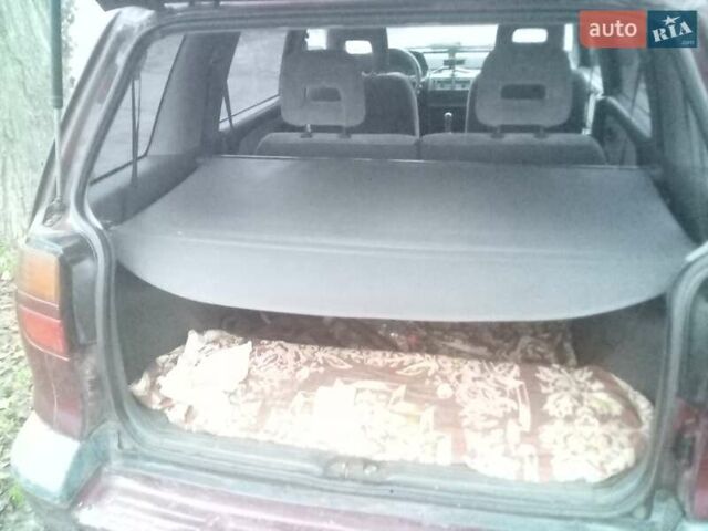 Красный Мицубиси Спейс Вагон, объемом двигателя 2 л и пробегом 300 тыс. км за 1700 $, фото 1 на Automoto.ua