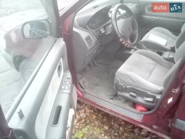 Красный Мицубиси Спейс Вагон, объемом двигателя 2 л и пробегом 300 тыс. км за 1700 $, фото 7 на Automoto.ua