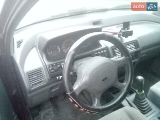 Красный Мицубиси Спейс Вагон, объемом двигателя 2 л и пробегом 300 тыс. км за 1700 $, фото 4 на Automoto.ua