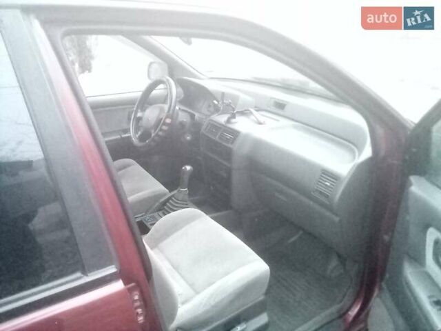 Красный Мицубиси Спейс Вагон, объемом двигателя 2 л и пробегом 300 тыс. км за 1700 $, фото 3 на Automoto.ua