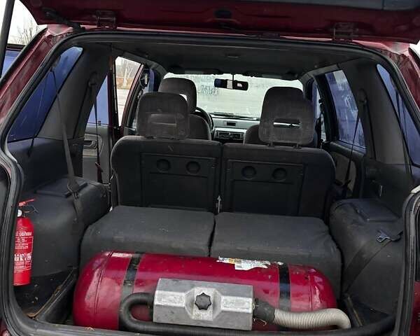 Красный Мицубиси Спейс Вагон, объемом двигателя 2 л и пробегом 480 тыс. км за 3500 $, фото 26 на Automoto.ua