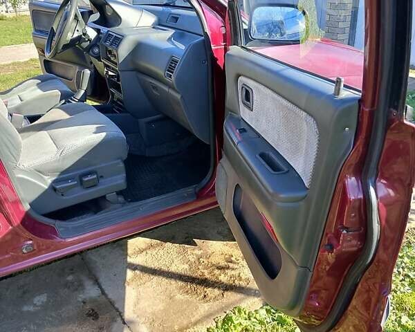 Міцубісі Спейс Вагон 1998 у Івано-Франківську на Automoto.ua Червоний Міцубісі Спейс Вагон, об'ємом двигуна 2 л та пробігом 200 тис. км за 1550 $, фото 22 на Automoto.ua