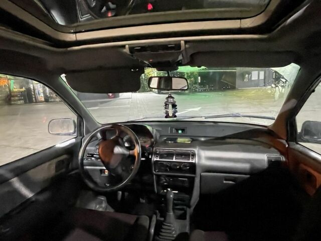 Красный Мицубиси Спейс Вагон, объемом двигателя 2 л и пробегом 300 тыс. км за 1050 $, фото 4 на Automoto.ua