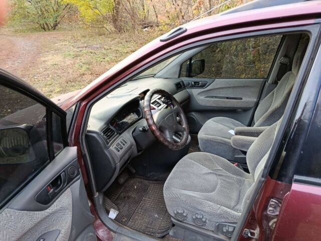 Красный Мицубиси Спейс Вагон, объемом двигателя 2.4 л и пробегом 200 тыс. км за 2944 $, фото 4 на Automoto.ua