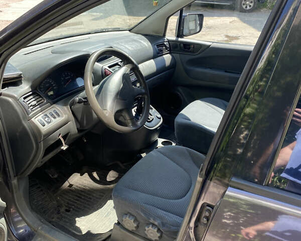 Міцубісі Спейс Вагон, об'ємом двигуна 2 л та пробігом 400 тис. км за 2700 $, фото 1 на Automoto.ua