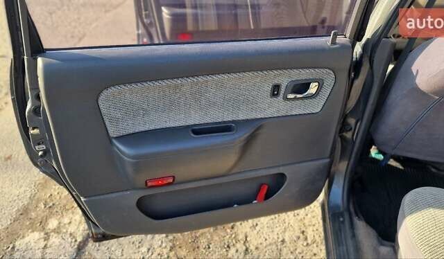 Серый Мицубиси Спейс Вагон, объемом двигателя 1.8 л и пробегом 410 тыс. км за 2000 $, фото 15 на Automoto.ua