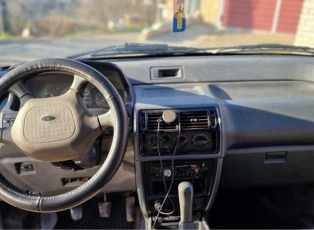 Сірий Міцубісі Спейс Вагон, об'ємом двигуна 1.8 л та пробігом 410 тис. км за 2000 $, фото 13 на Automoto.ua