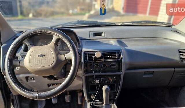 Серый Мицубиси Спейс Вагон, объемом двигателя 1.8 л и пробегом 410 тыс. км за 2000 $, фото 16 на Automoto.ua