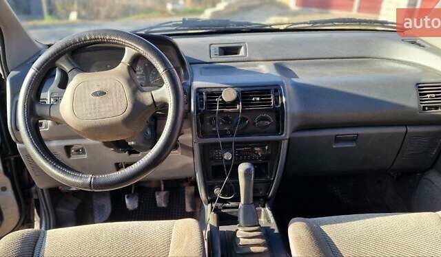 Серый Мицубиси Спейс Вагон, объемом двигателя 1.8 л и пробегом 410 тыс. км за 2000 $, фото 14 на Automoto.ua