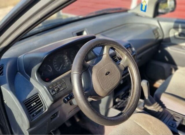 Сірий Міцубісі Спейс Вагон, об'ємом двигуна 1.8 л та пробігом 410 тис. км за 2000 $, фото 14 на Automoto.ua