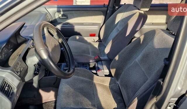 Серый Мицубиси Спейс Вагон, объемом двигателя 1.8 л и пробегом 410 тыс. км за 2000 $, фото 18 на Automoto.ua