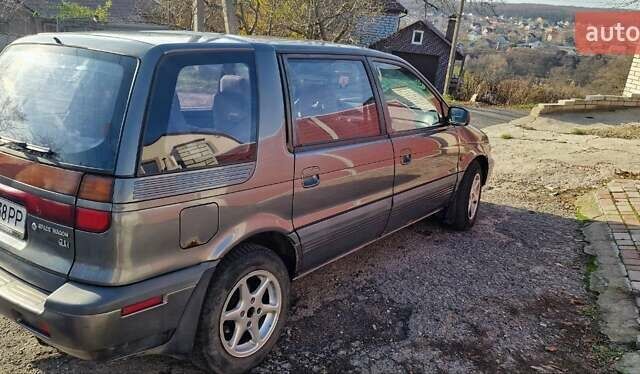 Серый Мицубиси Спейс Вагон, объемом двигателя 1.8 л и пробегом 410 тыс. км за 2000 $, фото 2 на Automoto.ua