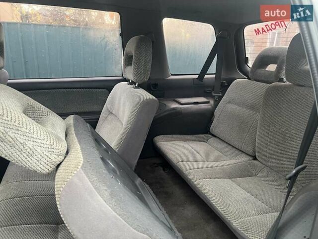 Серый Мицубиси Спейс Вагон, объемом двигателя 1.8 л и пробегом 300 тыс. км за 1500 $, фото 7 на Automoto.ua