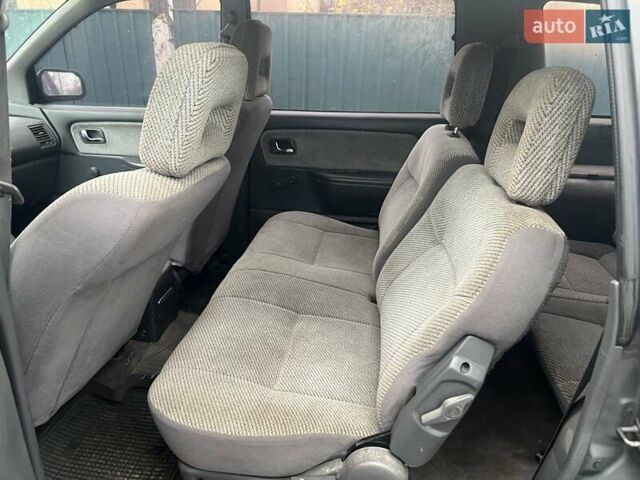 Серый Мицубиси Спейс Вагон, объемом двигателя 1.8 л и пробегом 300 тыс. км за 1500 $, фото 6 на Automoto.ua