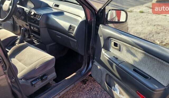 Серый Мицубиси Спейс Вагон, объемом двигателя 1.8 л и пробегом 410 тыс. км за 2000 $, фото 11 на Automoto.ua