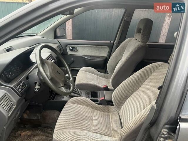 Серый Мицубиси Спейс Вагон, объемом двигателя 1.8 л и пробегом 300 тыс. км за 1500 $, фото 4 на Automoto.ua