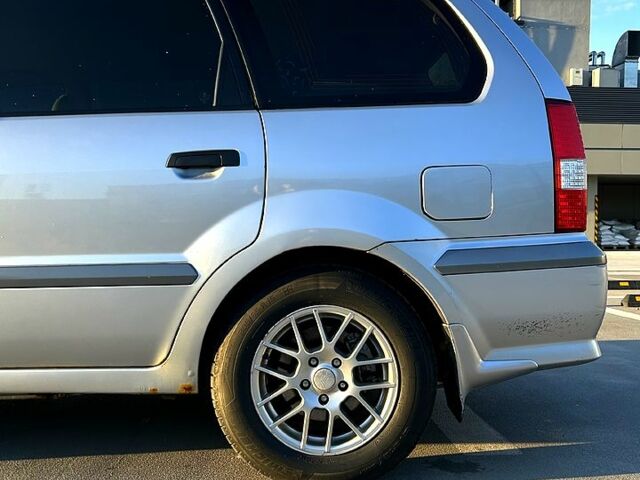 Серый Мицубиси Спейс Вагон, объемом двигателя 2 л и пробегом 394 тыс. км за 4500 $, фото 1 на Automoto.ua