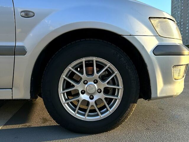 Серый Мицубиси Спейс Вагон, объемом двигателя 2 л и пробегом 394 тыс. км за 4500 $, фото 2 на Automoto.ua